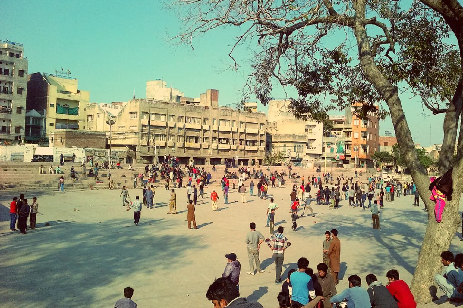 A crowd gathered on the open ground inside Mochi Gate, Lahore