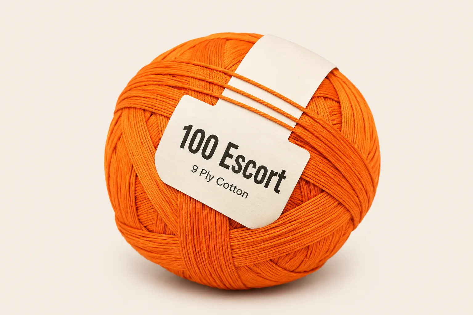 100 Escort pinna ball — orange 9-ply cotton with a plain 100 Escort shop tag