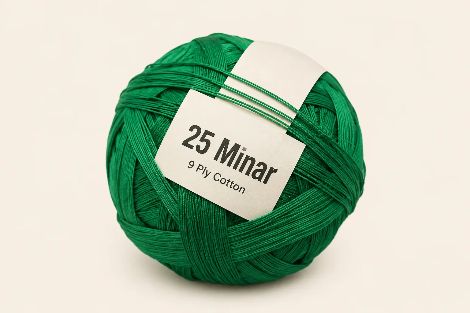 25 Minar pinna ball — green 9-ply cotton with a plain 25 Minar shop tag