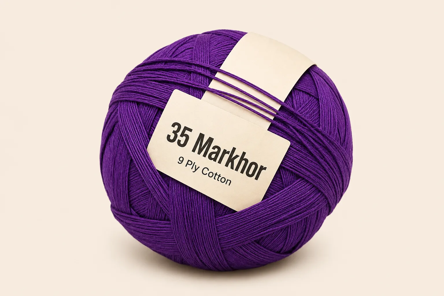 35 Markhor pinna ball — deep purple 9-ply cotton with a plain 35 Markhor shop tag